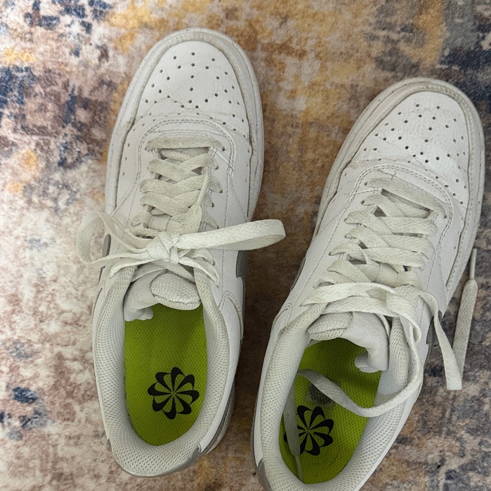 Nike airforce 1s with silver swoosh